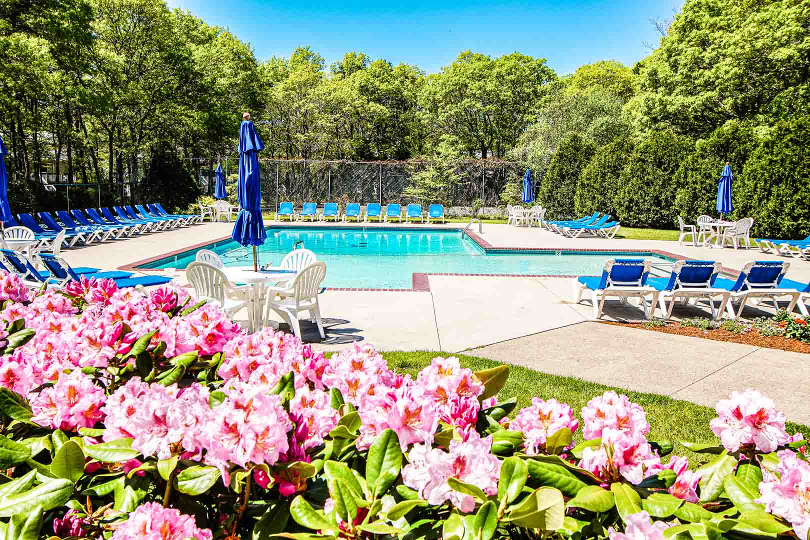 A beautiful view of the outdoor swimming pool at VRI's Sea Mist Resort in Massachusetts.